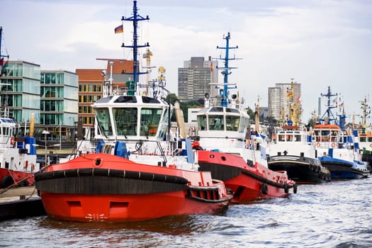 tugboats in a row