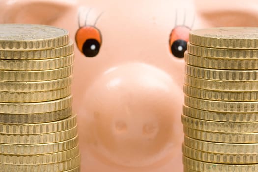 Piggy bank with two towers of coins