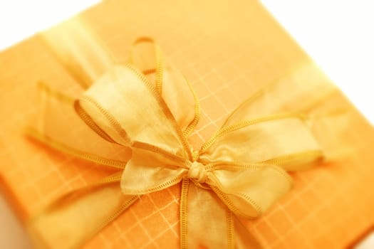 close up shot of an yellow giftbox