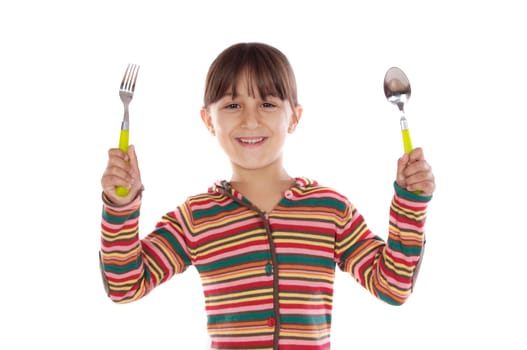 Adorable girl with fork and spoon ready