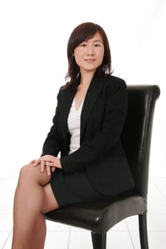 Asian Businesswoman With Mobile Phone