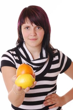 Girl with citrus fruits