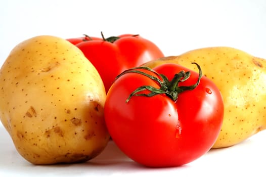 Two potatoes and two tomatoes