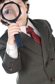 Kid with magnifying glass