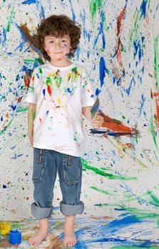 Boy playing with painting