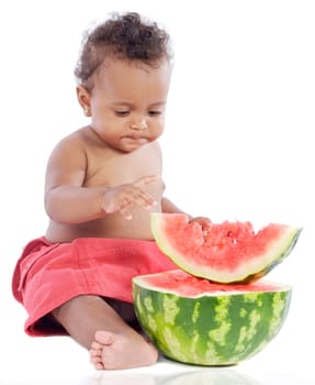Baby eating watermelon