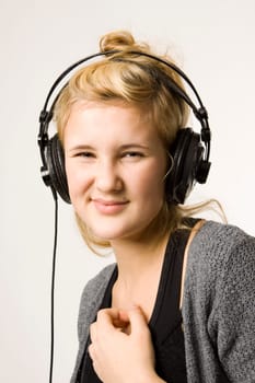 Young woman listening to music