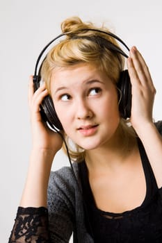 Young woman listening to music