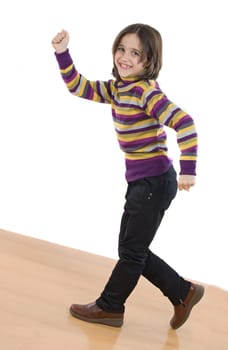 Joyful little girl walking