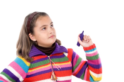 Adorable girl writing with fluorescent