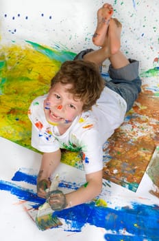 Boy playing with painting