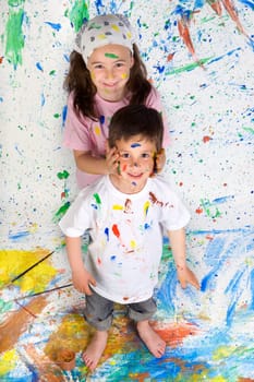 Friends playing with painting