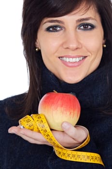 Woman whit apple and measuring tape