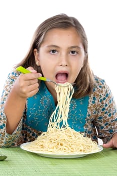 Precious girl eating spaghetti
