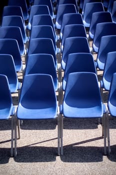 blue chairs in a row