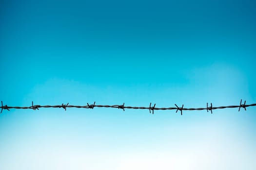 Barbed wire Fence and clear sky
