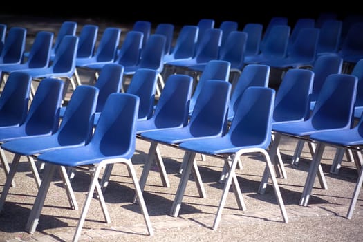 blue chairs in a row