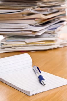 pencil and notebook on the table
