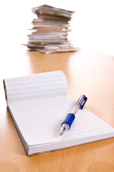 pencil and notebook on the table
