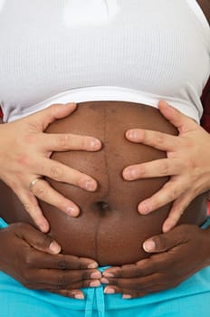 Pregnant woman with hand