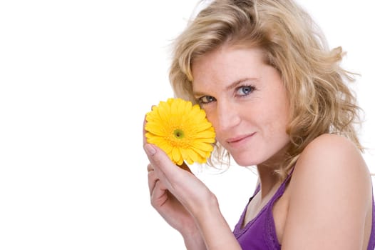Young woman with a gerbera