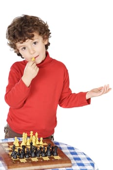 Adorable boy playing the chess