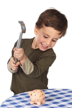 adorable boy breaking the money box