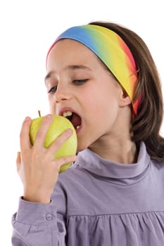 Beautiful girl biting an apple