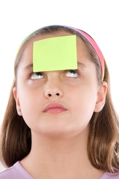 Adorable girl with a paper in her front