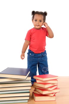 Adorable african baby with many books