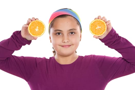 Attractive girl with oranges