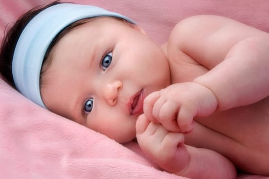 Adorable baby newborn with blue eyes