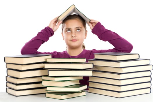 Adorable girl with many books