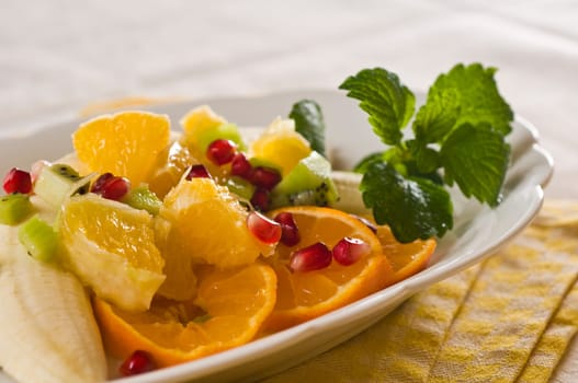 Fruit salad on white plate