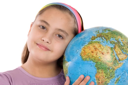 Adorable girl with a globe of the world