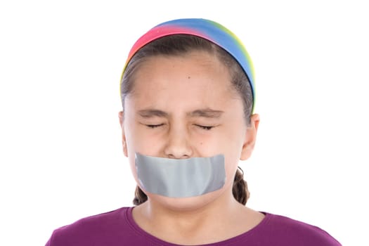Beautiful girl with adhesive onr mouth