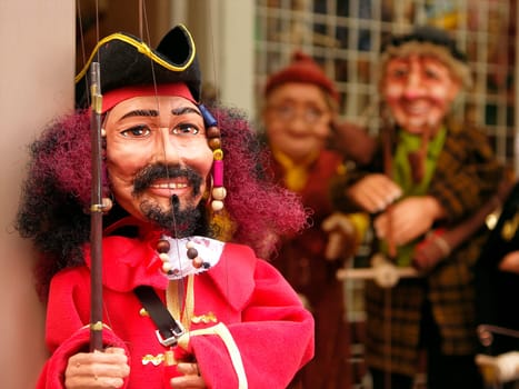 close up shot of handmade wooden Lucifer puppet