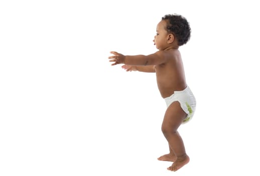 African baby with diaper learn to walk
