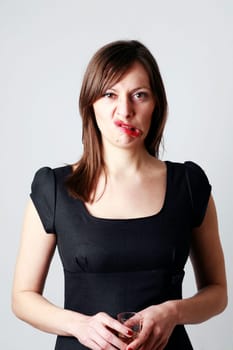 Young woman makes a grimace