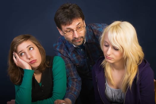 teacher explaining the lesson to schoolgirls