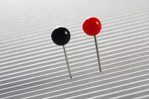 Moderation pins red and black
