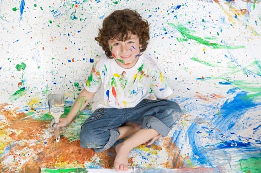 Boy playing with painting
