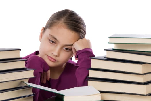 girl concentrated with many books