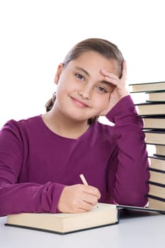 girl concentrated with many books