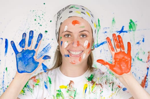 Girl with her hands painting