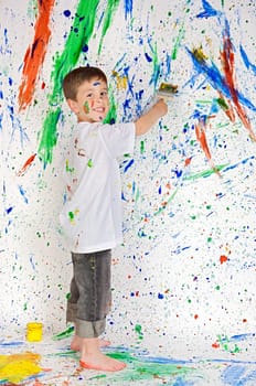 Boy playing with painting