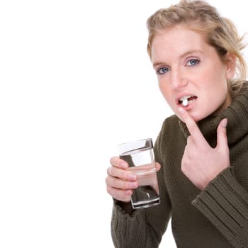 Young woman with tablet and glass of water