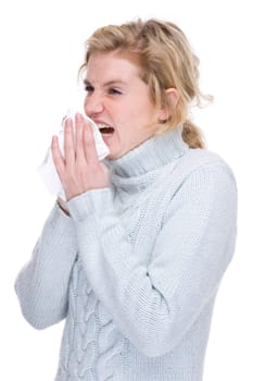 Woman blowing her nose