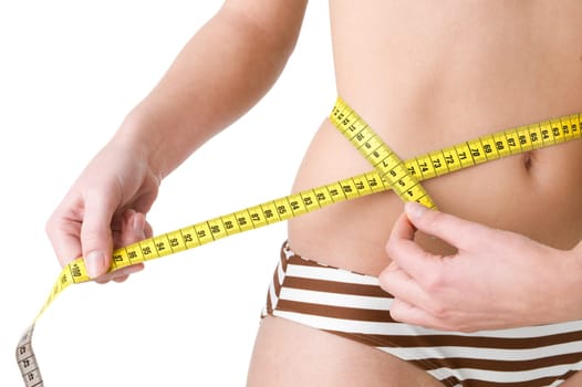 Woman with tape measure around waist