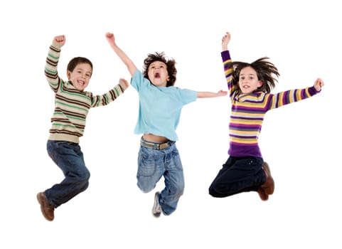 Three happy children jumping at once